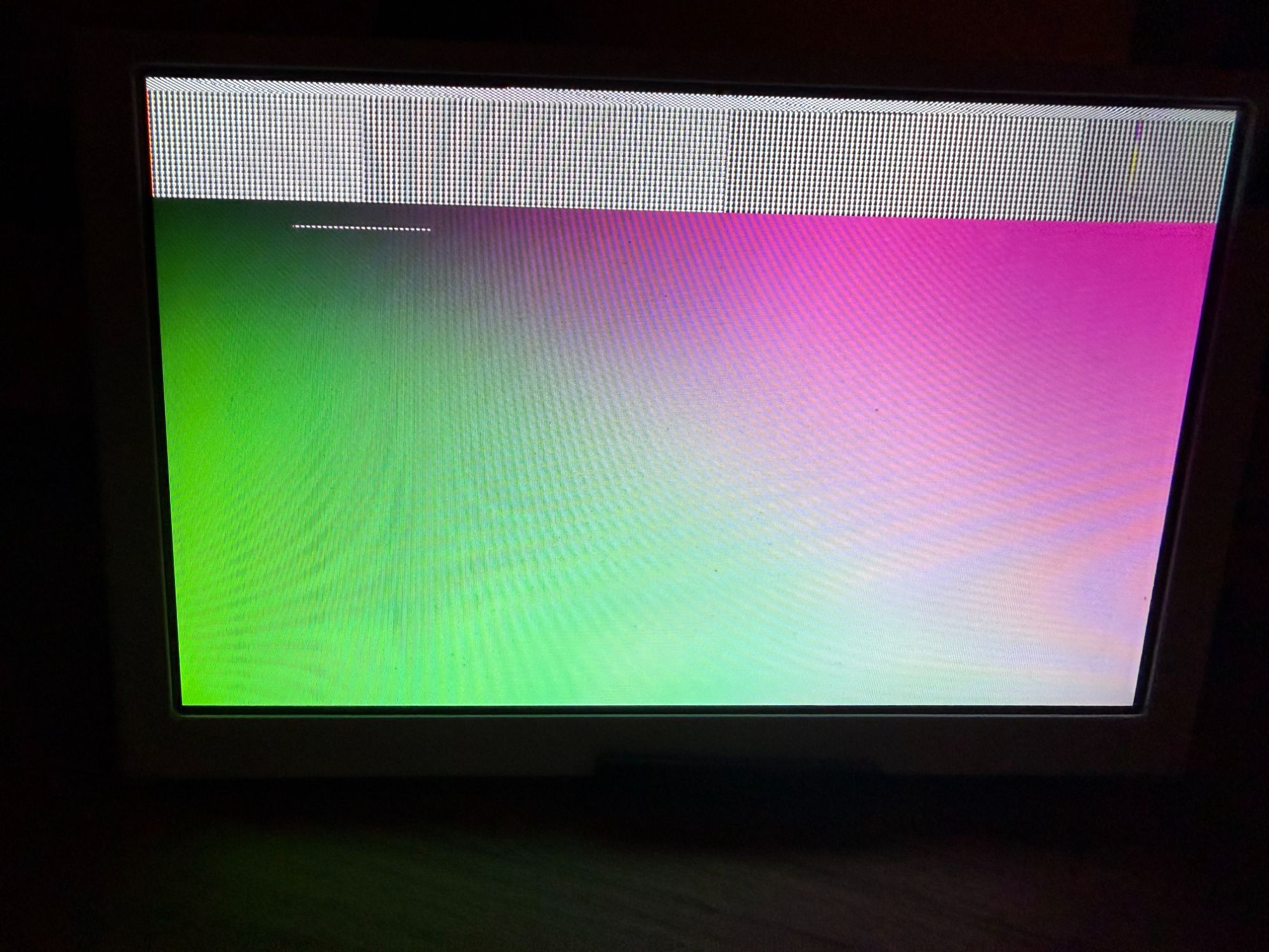 Green and pink. The display wants BGR, I was sending RGB.